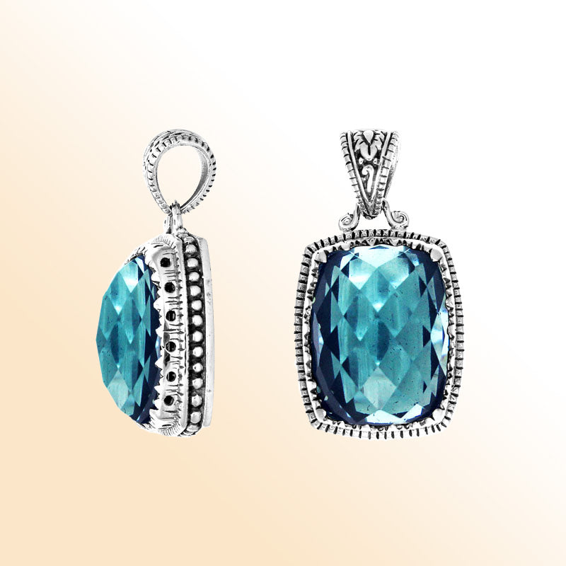 Handmade Blue Topaz Quartz cushion pendant in sterling silver with Balinese artistry.