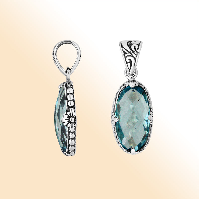 Elegant Sterling Silver oval Blue Topaz Quartz pendant with floral engraved detailing