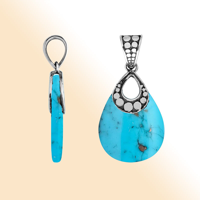 Sterling Silver Pendant With Teardrop Shape Turquoise Shell And Dot Pattern Design
