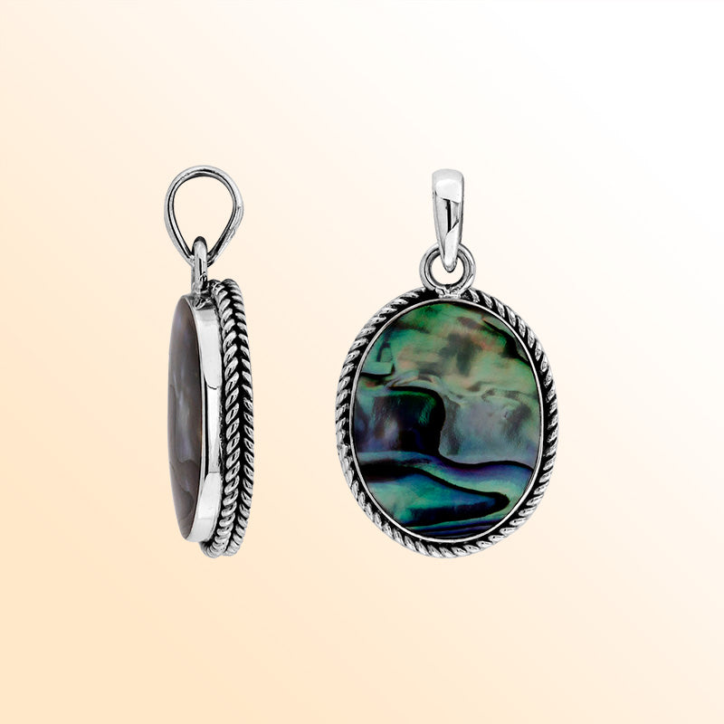 Sterling silver oval pendant with abalone shell and twisted rope silver frame handcrafted in Bali