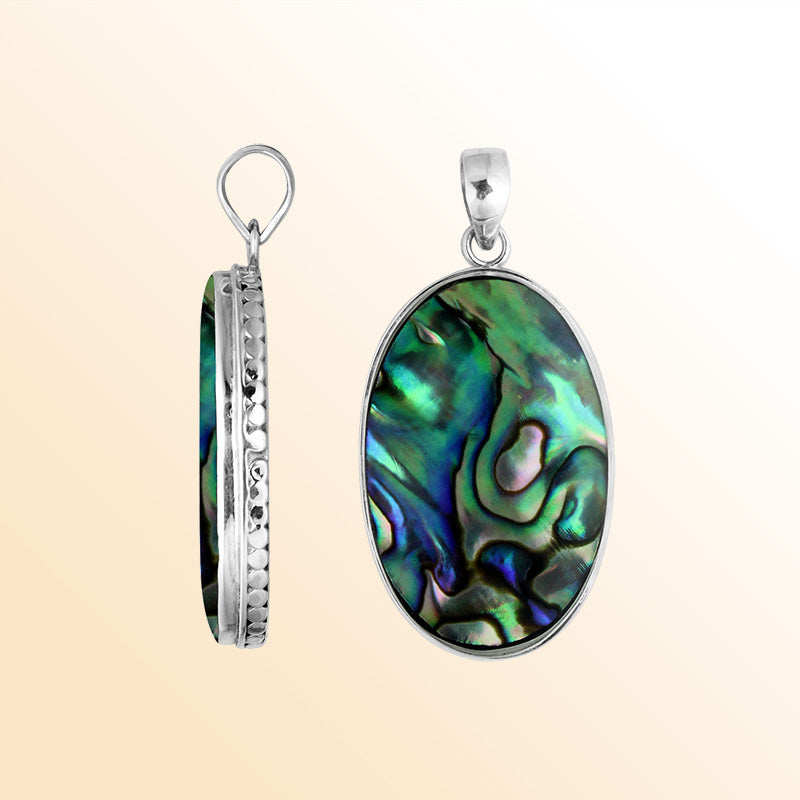 Sterling silver oval pendant with abalone shell and hammered silver edge handcrafted in Bali