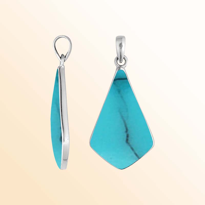 Sterling silver Shadow Crest pendant with smooth Turquoise Shell inlay and bold sculptural shield silhouette