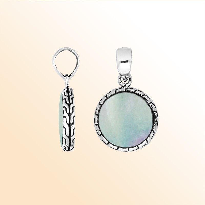 Sterling silver halo pendant with mother of pearl center and Balinese pattern handcrafted in Bali.