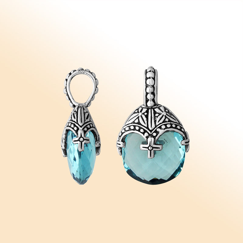 Elegant sterling silver blue topaz quartz heart pendant with ornate Balinese handcrafted detailing