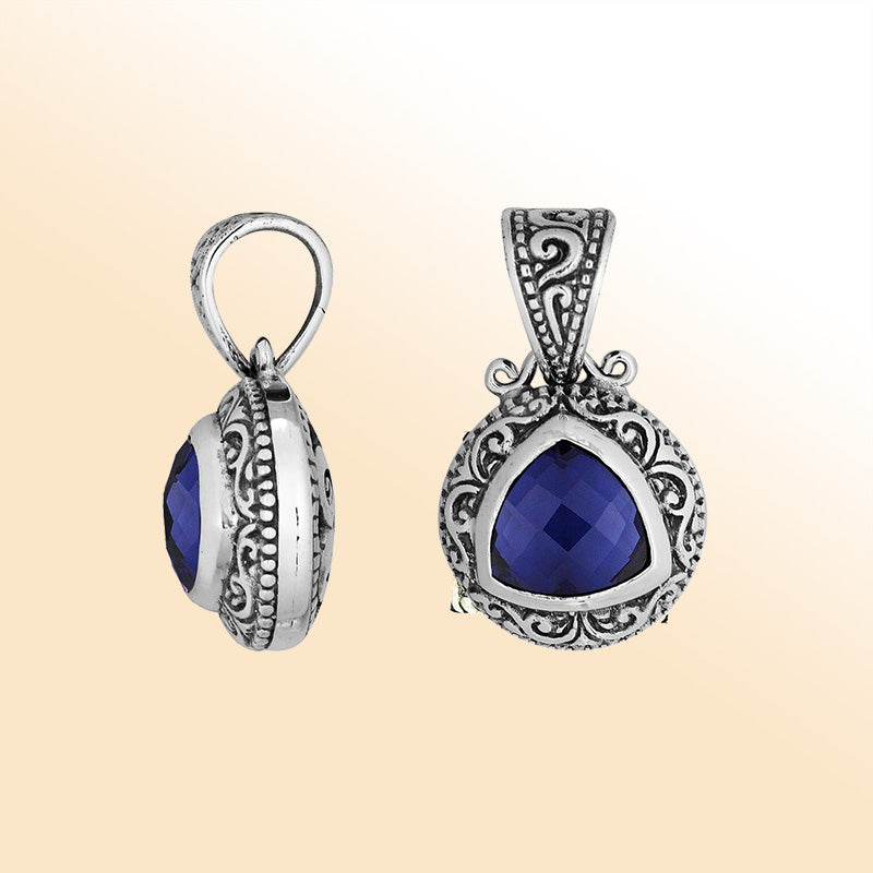 Elegant sterling silver triangular pendant with Sapphire Quartz and Balinese handcrafted detailing