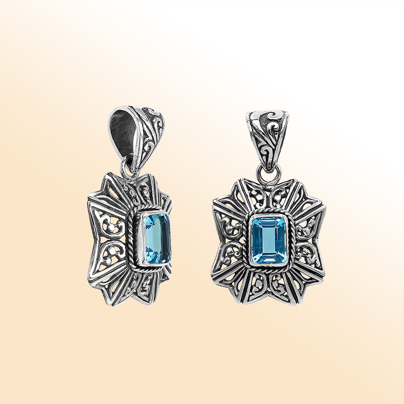 Elegant sterling silver Blue Topaz Quartz pendant with artistic Balinese handcrafted filigree design.