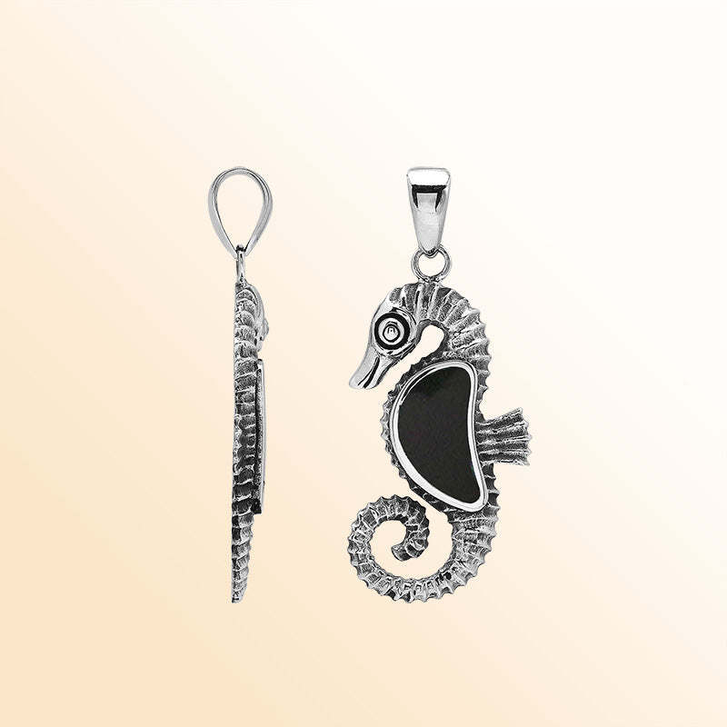 Elegant sterling silver seahorse pendant with polished Black Shell and Balinese handcrafted design.