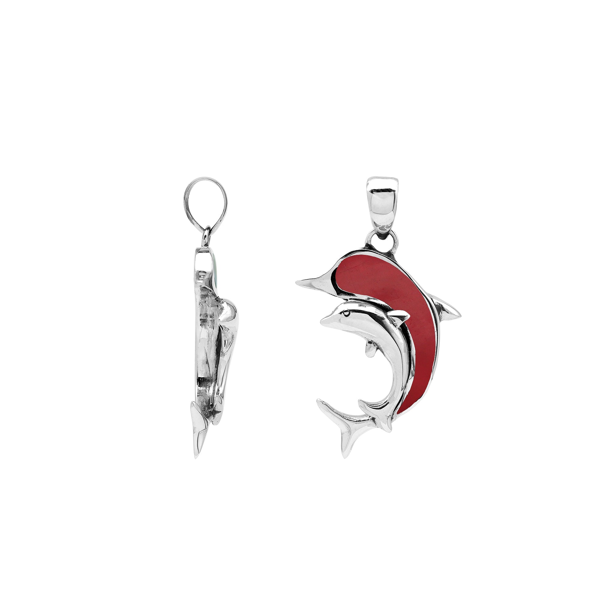 Elegant sterling silver dolphin pendant with red coral inlay and Balinese craftsmanship in a high-polish ocean-inspired design.