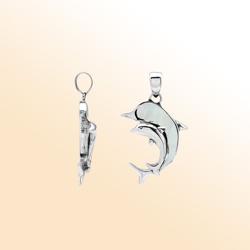Elegant sterling silver dolphin pendant with mother of pearl inlay and Balinese craftsmanship in a polished ocean-inspired design.