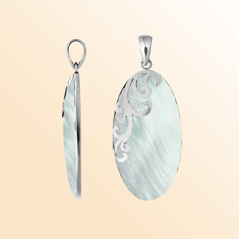 Elegant handcrafted sterling silver pendant with Mother Of Pearl and flowing leaf motif.