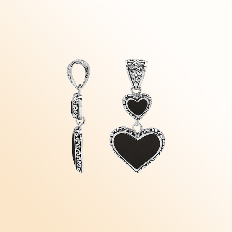 Artisan sterling silver double heart pendant with Black Shell and Balinese accents.
