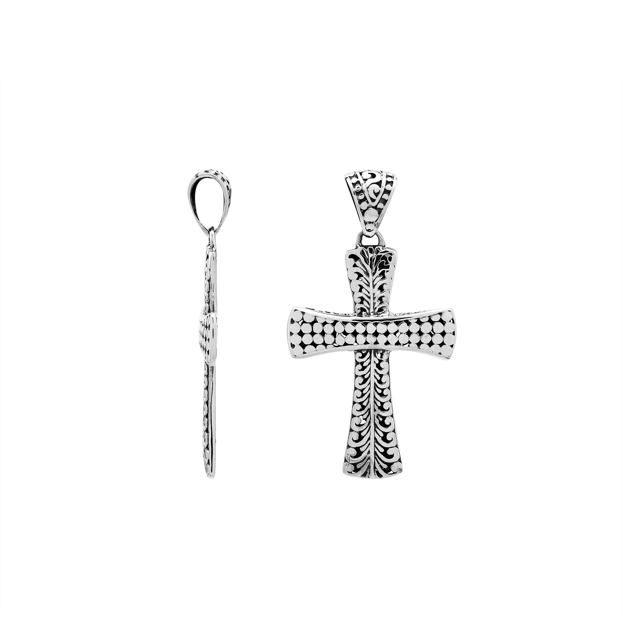 Artisan sterling silver engraved cross pendant with Balinese accents.