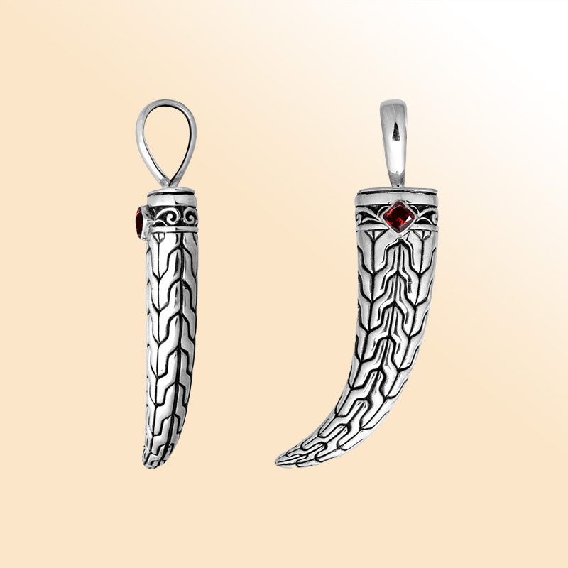 Artistic sterling silver engraved horn pendant with tribal pattern and Red Garnet Quartz accent created for modern expressive jewelry styling