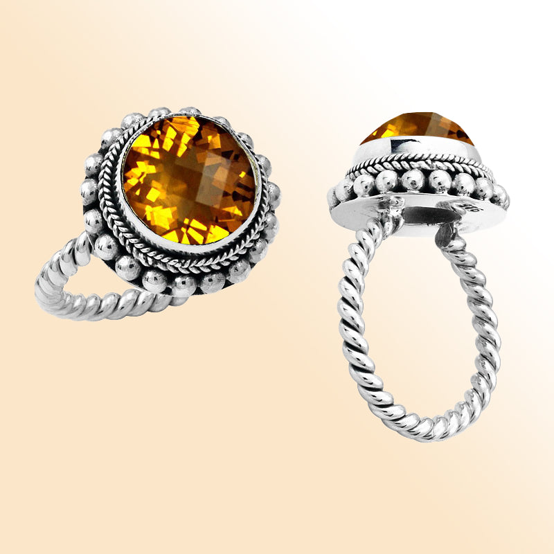 Handcrafted sterling silver Bali ring with faceted Citrine Quartz and twisted rope band design.