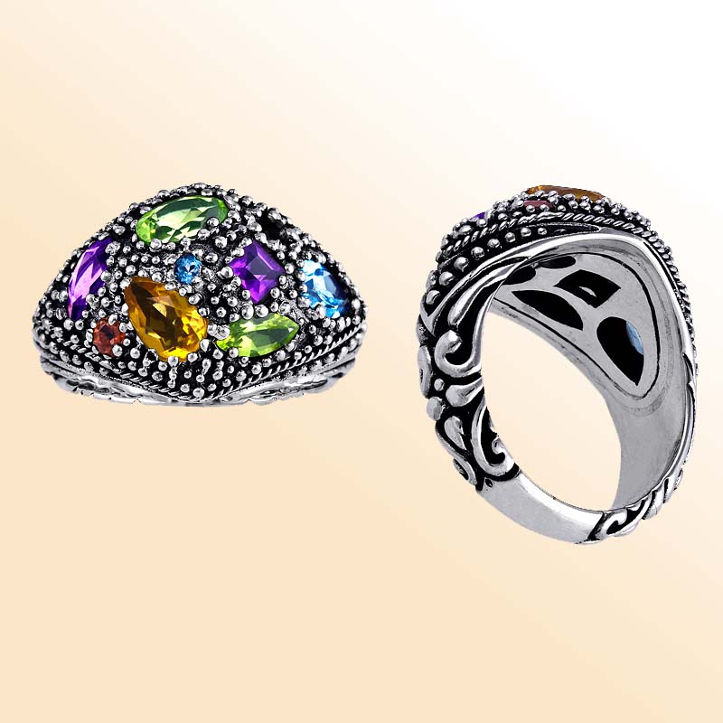Sterling silver dome ring with amethyst quartz, citrine quartz, peridot quartz, blue topaz quartz, and garnet quartz, detailed with Bali-inspired beaded silverwork – colorful artisan statement jewelry for women.