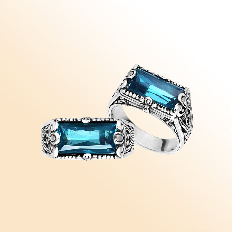 Sterling silver rectangular London Blue Topaz Quartz ring with faceted quartz and intricate Bali-inspired detailing, handcrafted artisan statement jewelry for women.