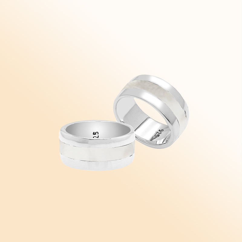 Handcrafted sterling silver wide band ring with luminous Mother of Pearl inlay, unisex artisan jewelry for everyday wear or gifting.
