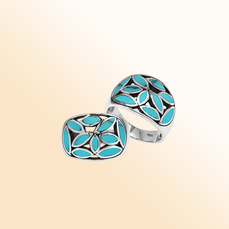 Handcrafted sterling silver wide band ring with vibrant Turquoise Shell inlay, bold artisan jewelry with mosaic leaf design.