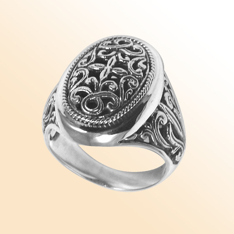 Elegant sterling silver oval ring with intricate Balinese design, handcrafted 925 silver statement ring, artisan jewelry for men and women.