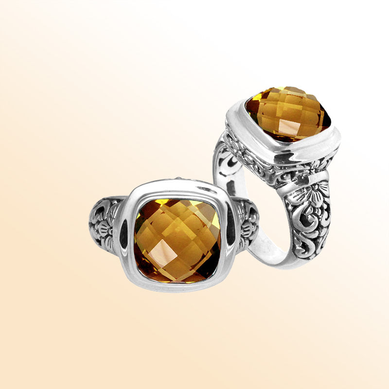 Handcrafted Bali silver ring with cushion-cut Citrine Quartz and artisan carvings.
