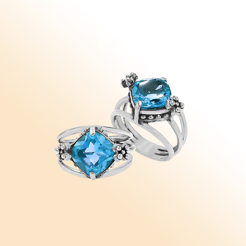 Handmade sterling silver Blue Quartz ring with floral details and split shank, artisan Bali jewelry.