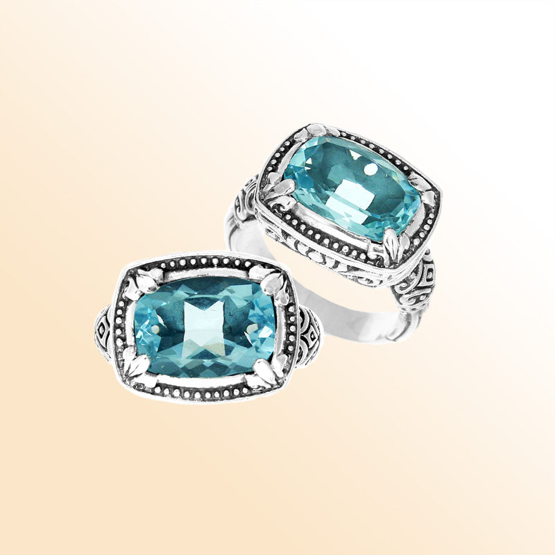Handmade sterling silver Balinese ring with cushion-cut Blue Topaz Quartz and beadwork details.