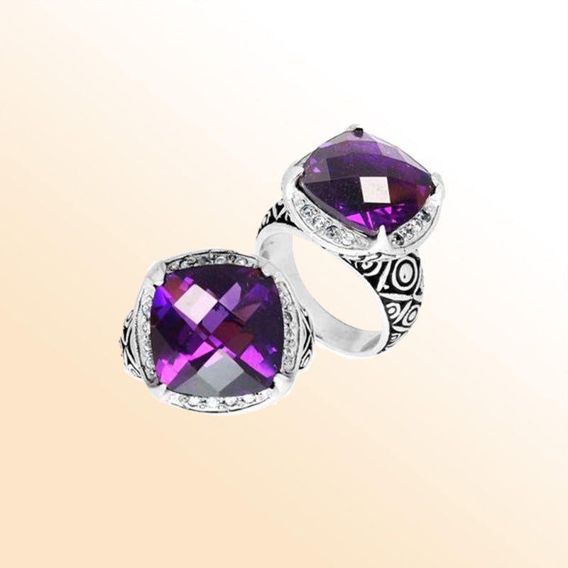 Handmade sterling silver Balinese ring with cushion-cut Amethyst Quartz in vivid purple hues.
