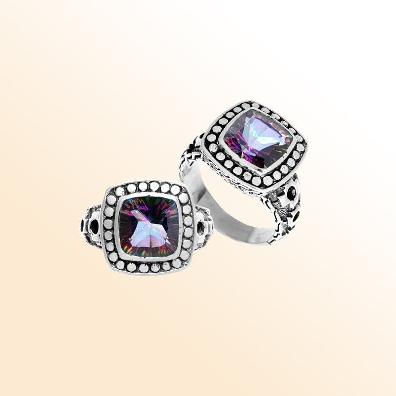 Handmade sterling silver Balinese ring with cushion-cut Mystic Quartz in dotted bezel design.