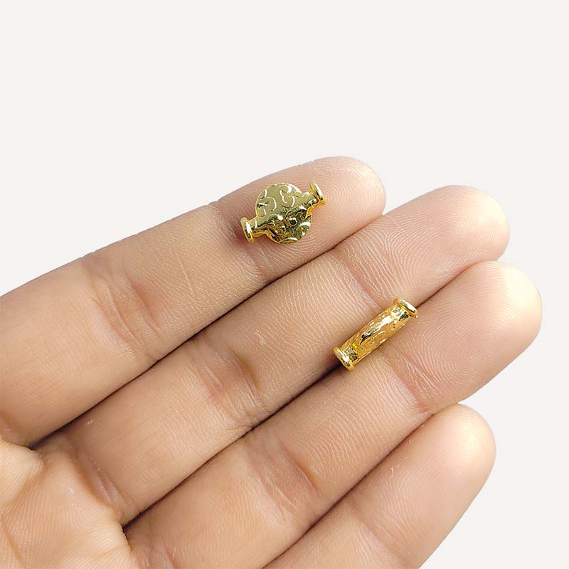 India-crafted textured mini vessel bead with 18K gold overlay and copper core for retail jewelry making.