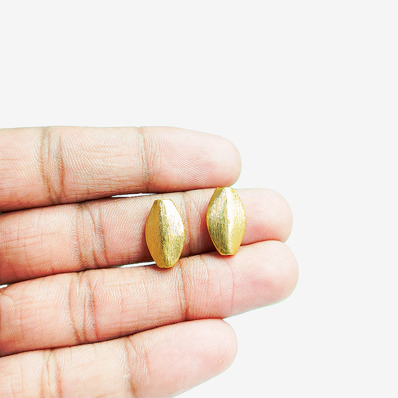 Handcrafted 18K gold overlay brushed oval copper bead from India for jewelry making.