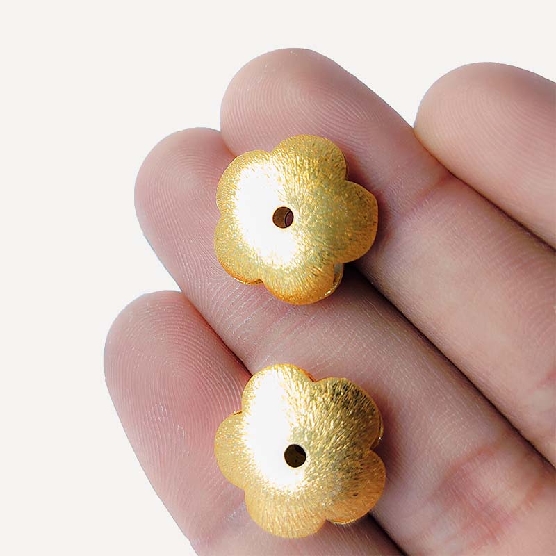 Handcrafted floral jewelry bead with 18K gold overlay made in India.