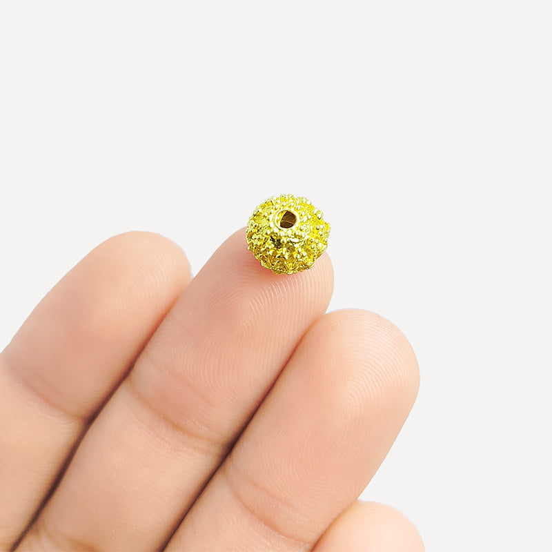 Handcrafted round textured bead with 18K Gold Overlay Over Copper made in India