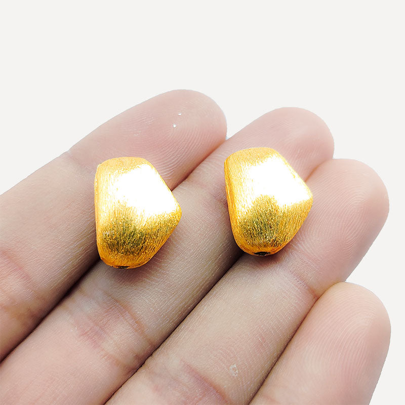 Organic pebble jewelry accent with 18K gold overlay over copper handcrafted in India