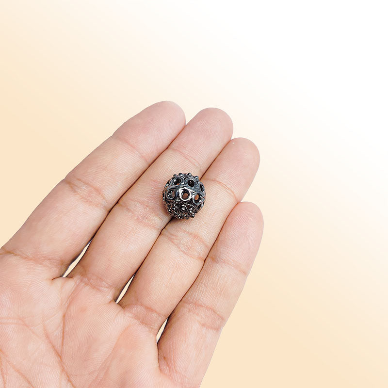 Handcrafted black rhodium overlay round filigree bead from India with detailed openwork for designer jewelry.
