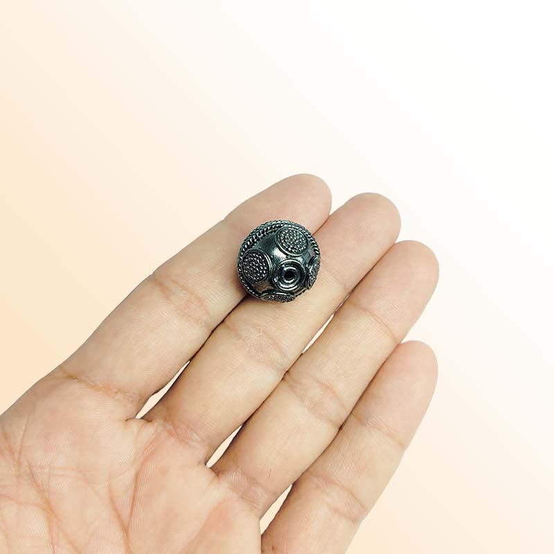 Black rhodium textured round bead handcrafted in India with detailed dotted design for statement jewelry making