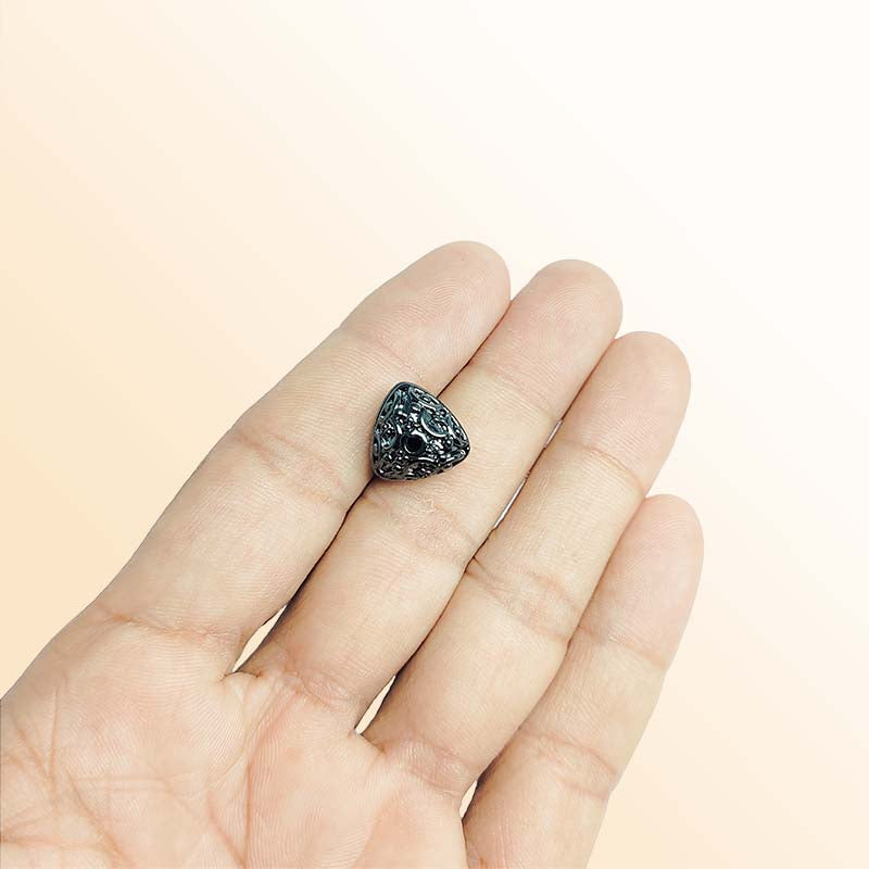 Handcrafted black rhodium overlay copper bead from India with decorative artisan detailing for jewelry designs