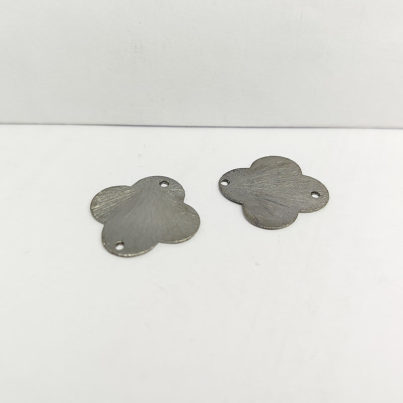 Handcrafted black rhodium overlay copper clover connector from India with brushed minimalist finish