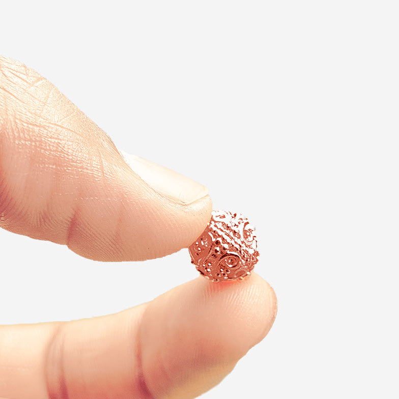 Ornamental rose gold overlay copper filigree bead handcrafted in India for jewelry designs