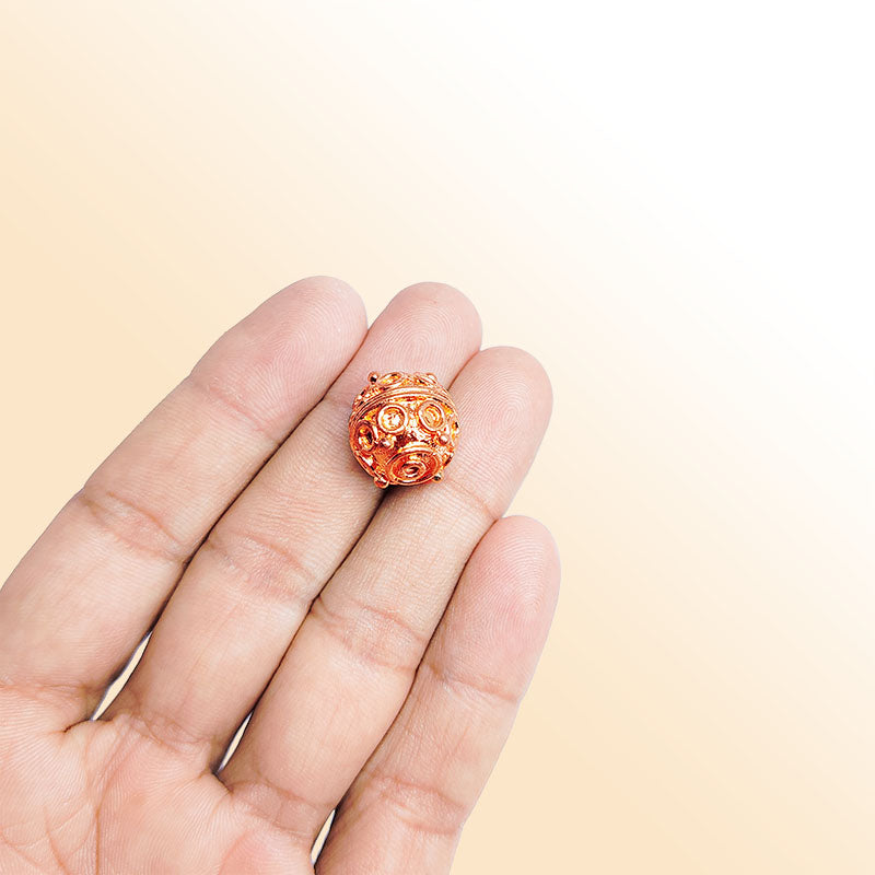 Classic rose gold overlay copper concentric bead handcrafted in India for jewelry designs