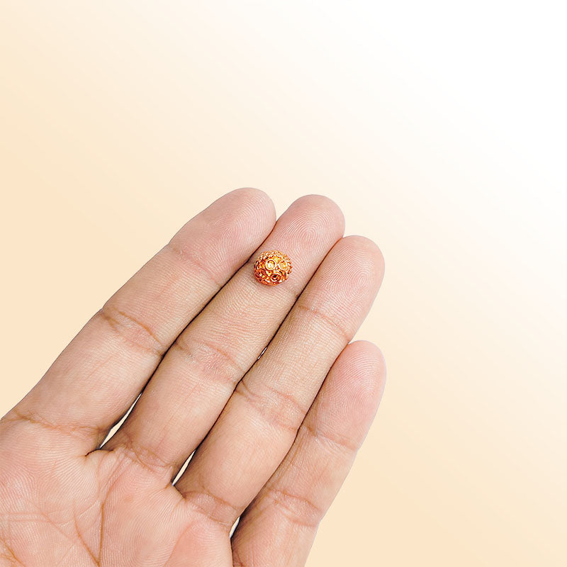 Handcrafted rose gold overlay over copper cylinder bead from India with textured finish for jewelry making