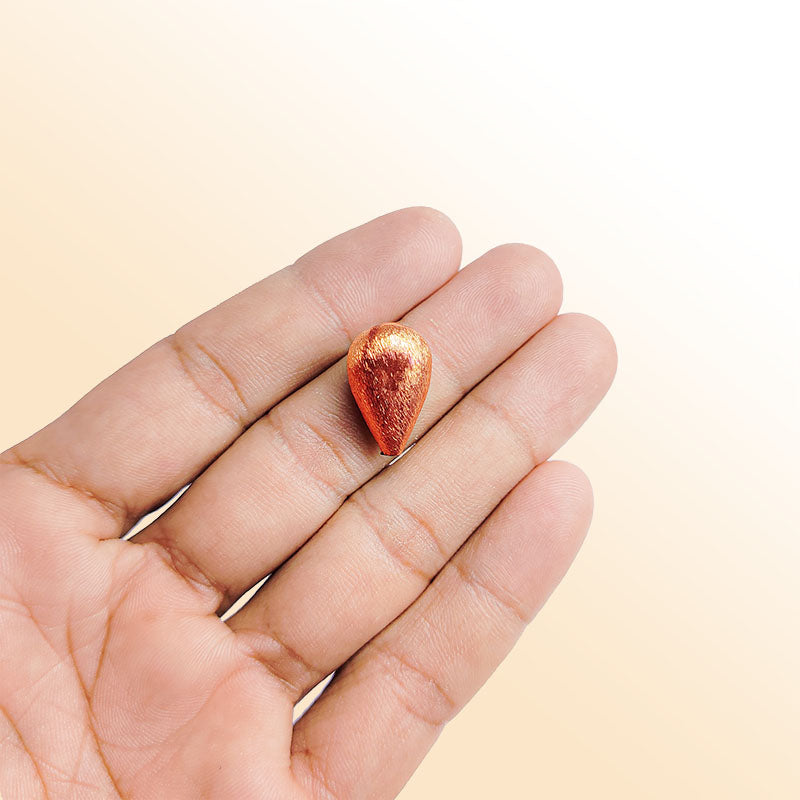 Rose gold overlay copper teardrop bead handcrafted in India for retail jewelry making