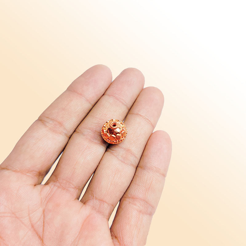 Rose gold floral copper bead handcrafted in India with embossed detailing and polished finish