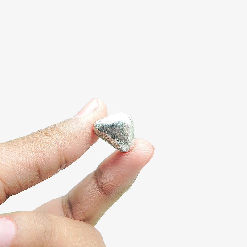 Modern silver and copper asymmetrical wedge decor accent handcrafted in India with textured silver finish