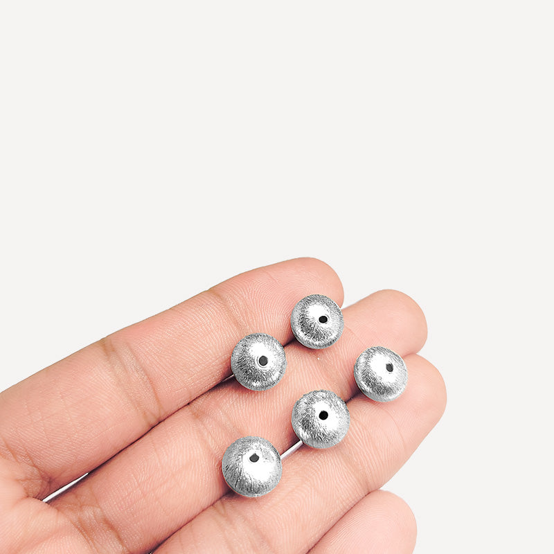 Silver overlay over copper textured round bead handcrafted in India