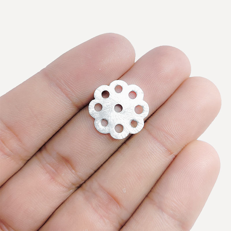 Artisan silver overlay over copper handcrafted floral disc bead with multiple holes made in India for jewelry making