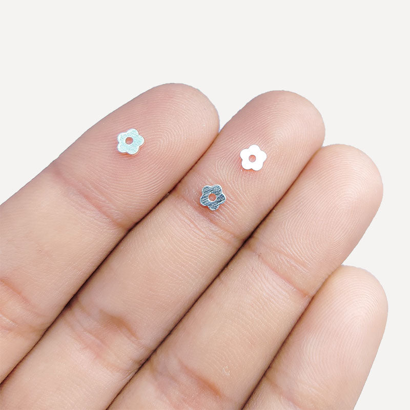 Handcrafted Silver Overlay Over Copper flower spacer beads from India with textured silver finish for DIY jewelry.