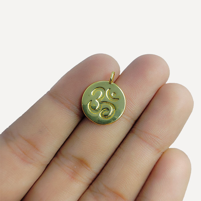 OM symbol round charm in 18K Gold Overlay Over Copper, handcrafted in India.