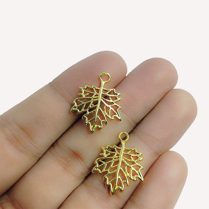 Elegant leaf cutout charm with openwork design, 18K Gold Overlay Over Copper, handcrafted in India.