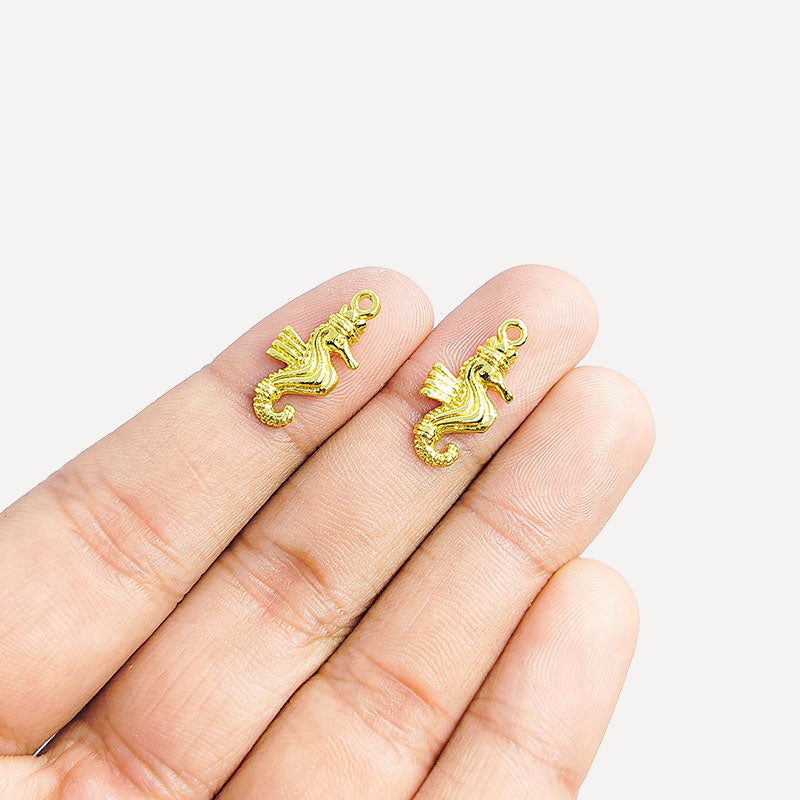 Handcrafted seahorse charm in 18K Gold Overlay Over Copper from India for nautical and ocean-inspired jewelry designs.