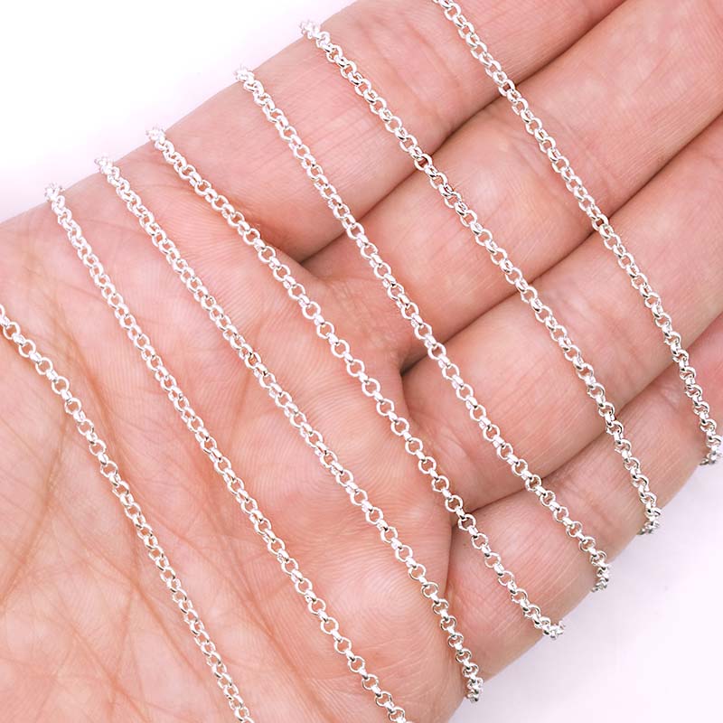 Silver overlay over copper round link chain with polished finish and elegant smooth circular links displayed on white background for retail jewelry use